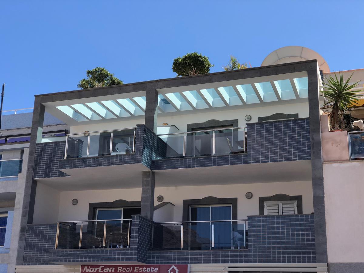 Billy'S Beachfront Apartment With Pool Access Пуерто де Мохан Екстериор снимка